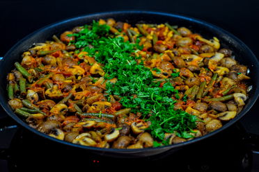 Paella mit Champignons